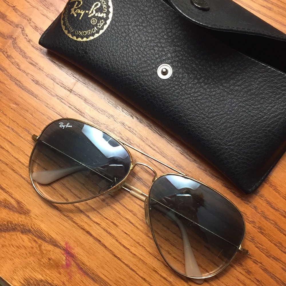 Light blue and gold Ray Ban Aviator glasses